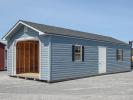 14x32 Peak Single-Car Garage With Twilight Blue Vinyl Siding, White Overhead Door, Black Shutters, and Shingle Roof