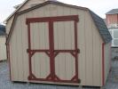 Pine Creek 10x12 Madison Mini Barn with PC Clay walls, Red trim and, Charcoal shingles